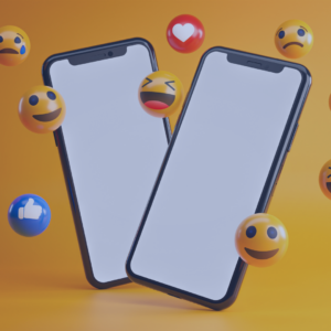 ícones de emojis em torno de celular